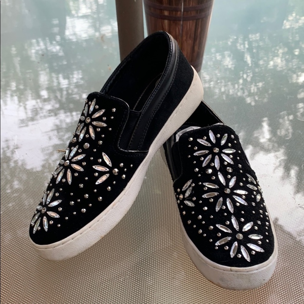 Michael Kors slip on sneakers.